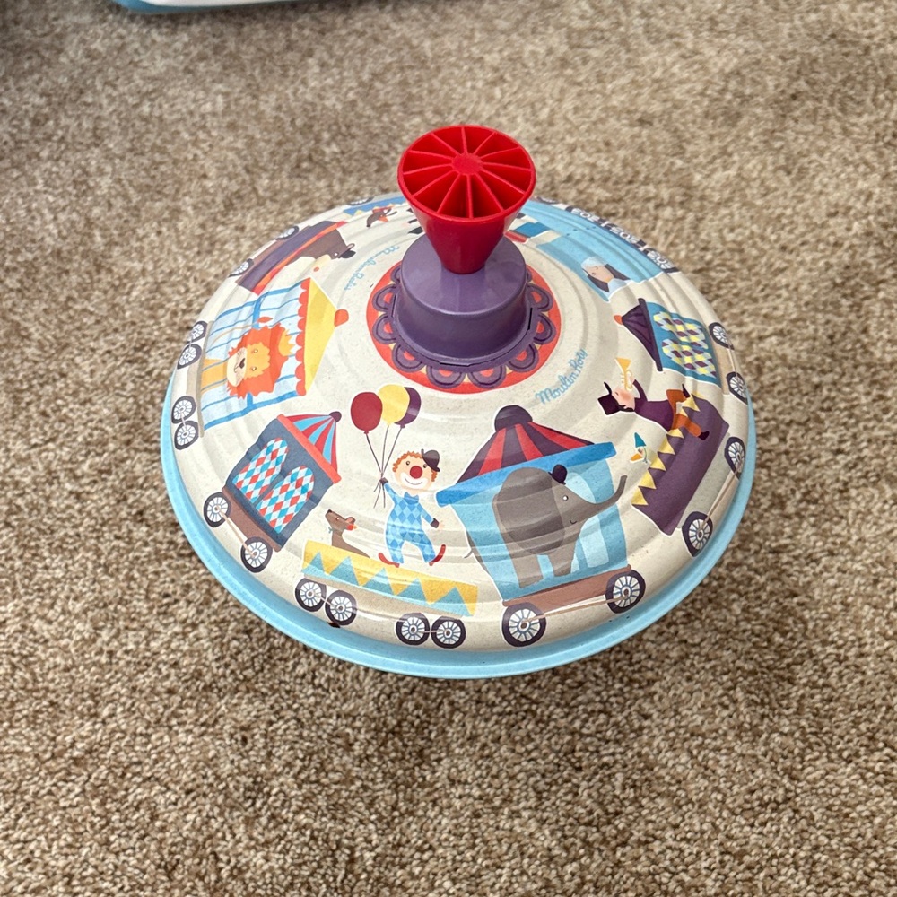Moulin roty toddler Carnival Print Spinning Top Toy slighlty broken still works